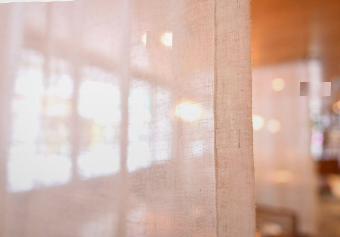 Long timber chef's table set for ten